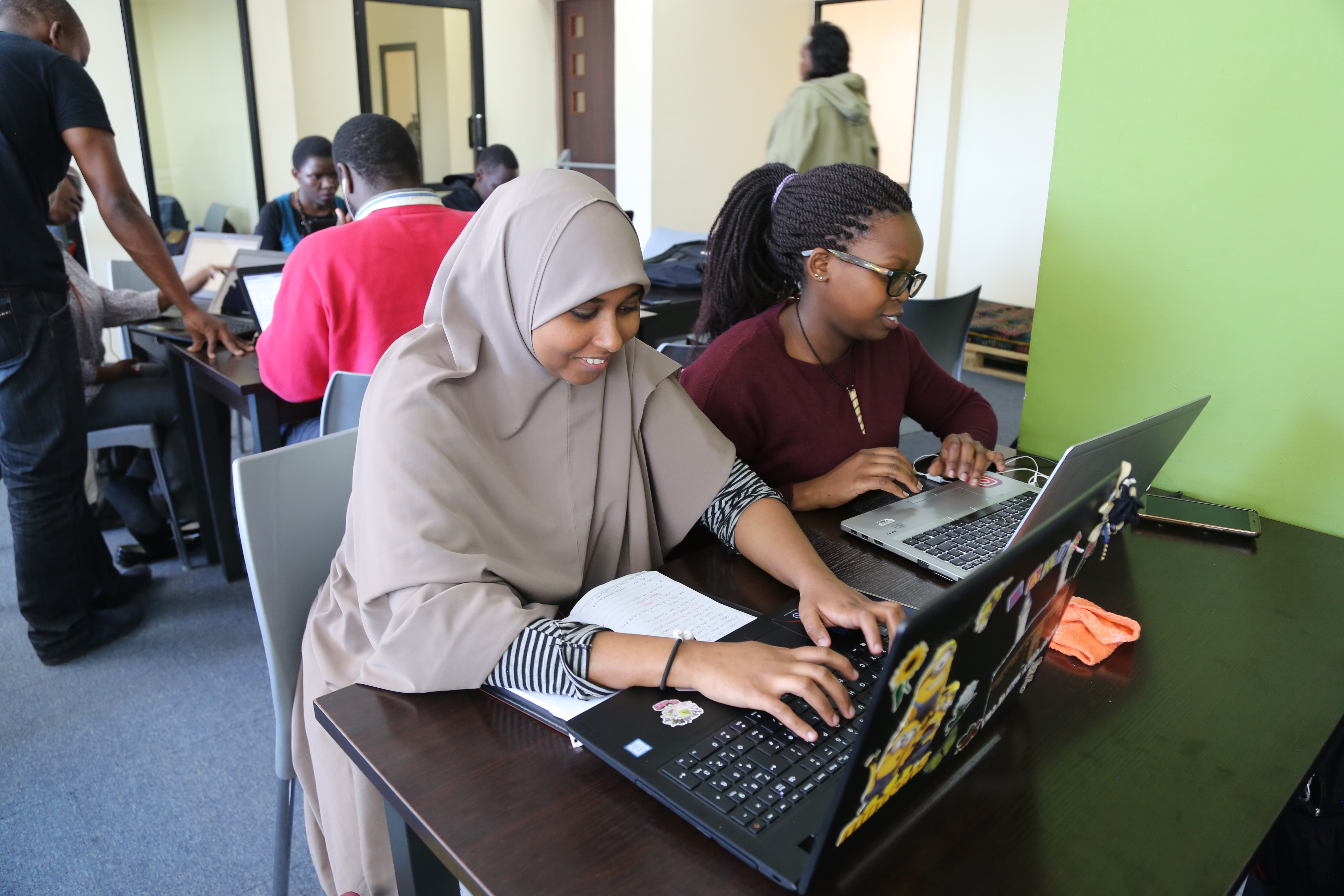 Two students at the Moringa School based in Nairobi work on developing their coding skills. Image by Janelle Richards. Kenya, 2017. Two students at the Moringa School based in Nairobi work on developing their coding skills. Image by Janelle Richards. Kenya, 2017.