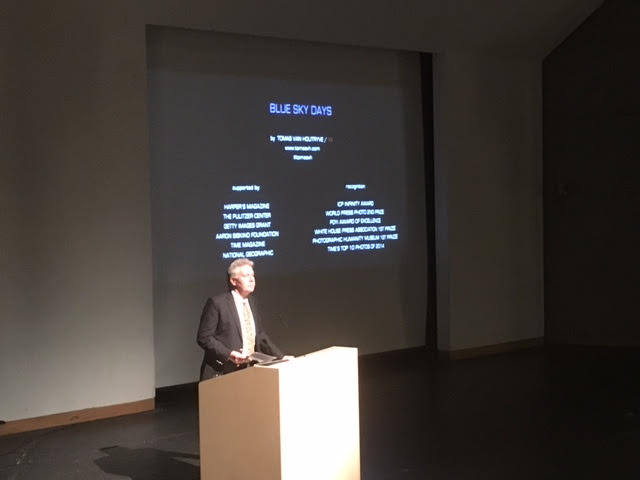 Pulitzer Center Executive Director Jon Sawyer speaking on the launch of "NewsArts" in the auditorium at Southeastern Center for Contemporary Art (SECCA). Image by Fareed Mostoufi. United States, 2016. Jon Sawyer speaking on the launch of NewsArts in the auditorium at Southeastern Center for Contemporary Art (SECCA). Image by Fareed Mostoufi. United States, 2016.