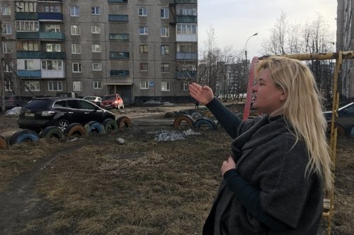 Anna Kireeva near some of the Soviet-era apartment blocks Murmansk, Russia. Image by Amy Martin. Russia, 2018. Anna Kireeva near some of the Soviet-era apartment blocks Murmansk, Russia. Image by Amy Martin. Russia, 2018.