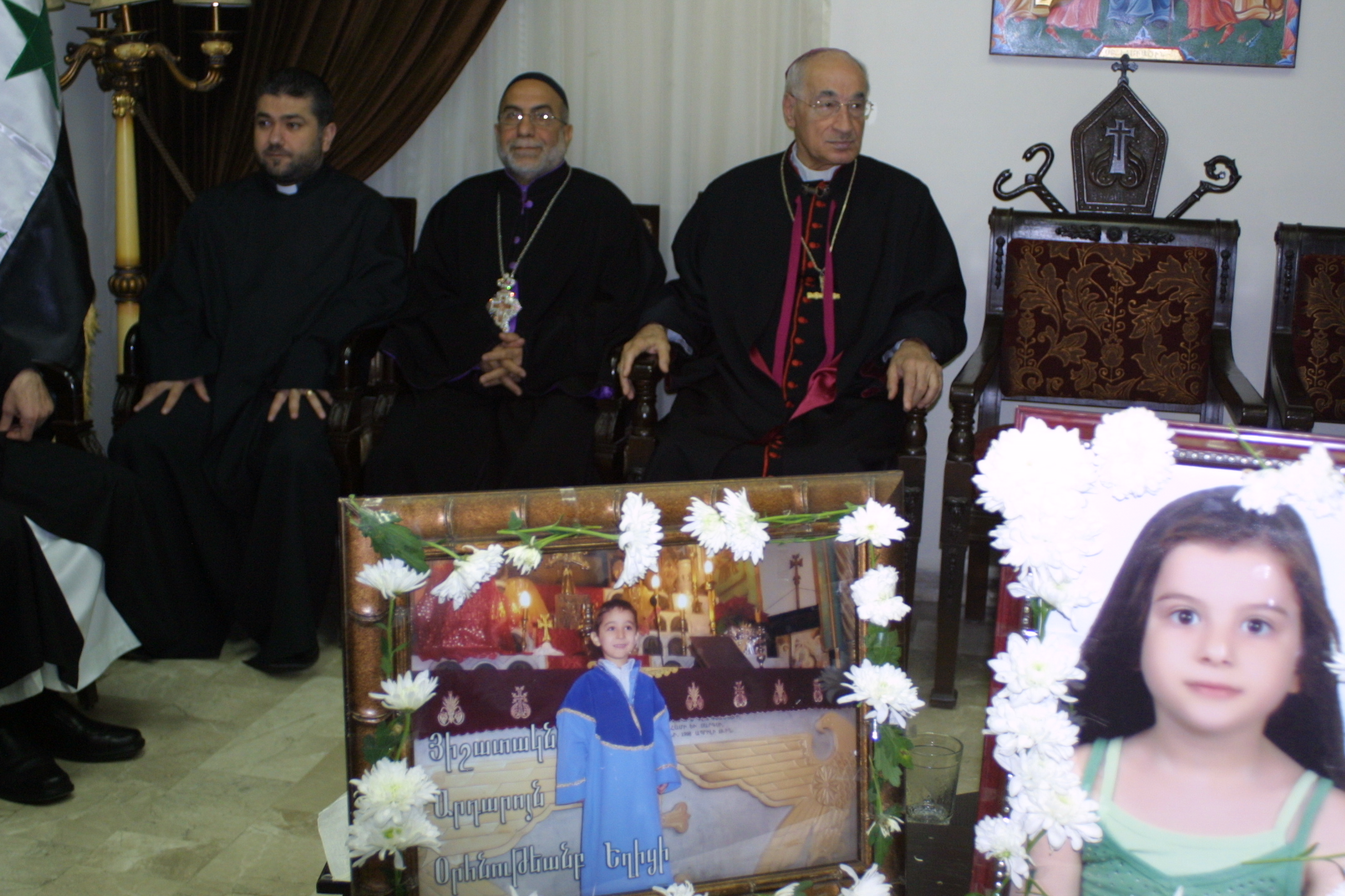Funeral for children killed during rebel mortar attack on civilian neighborhood in Damascus. Image by Reese Erlich. Syria, 2013. Media file: armenian_church_2.jpg