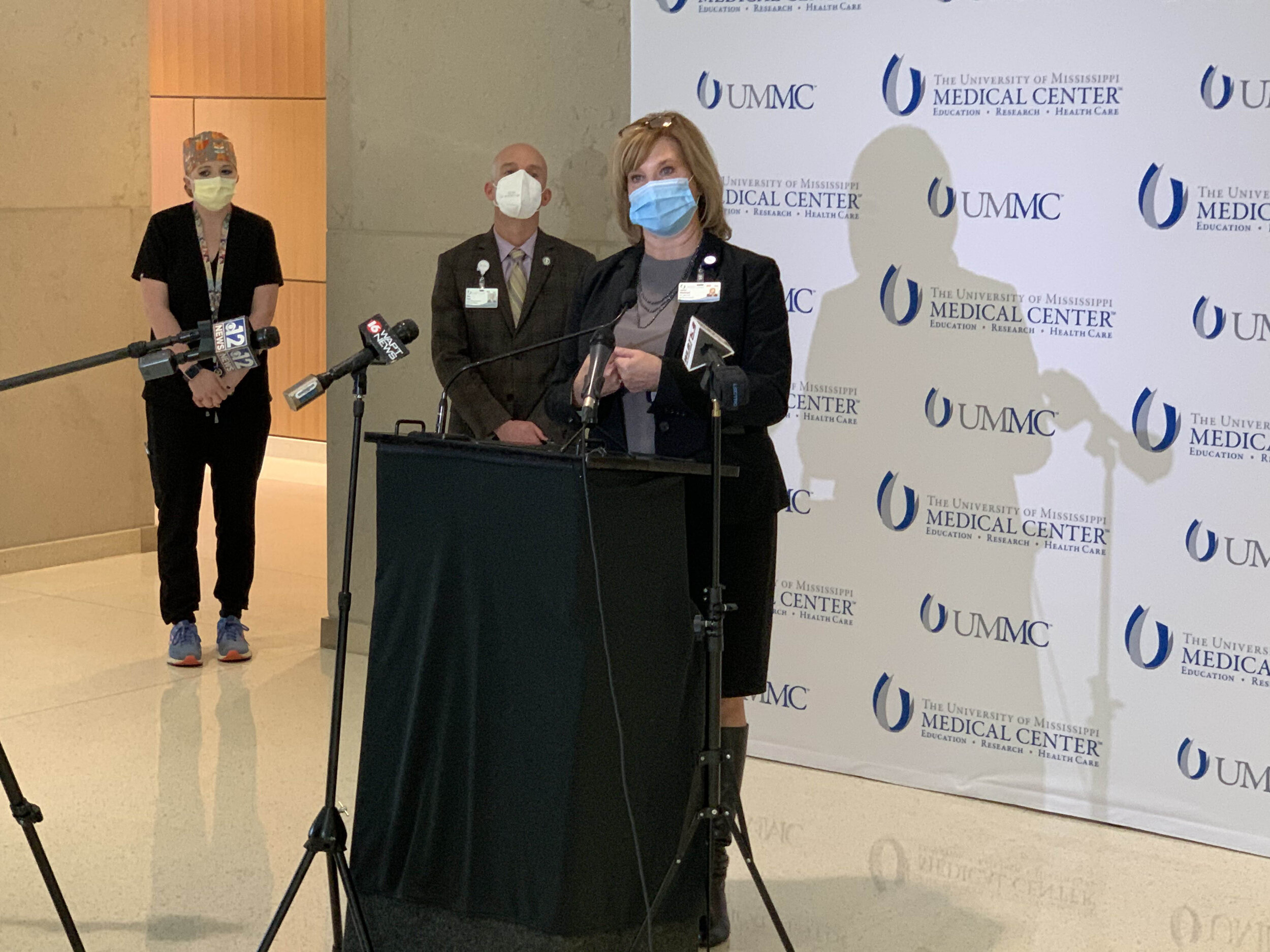During a news conference Monday, Nov. 23, 2020, Dr. LouAnn Woodward (at podium), vice chancellor for health affairs and dean of the School of Medicine at the University of Mississippi Medical Center, calls for the statewide mask mandate to be resumed. Image courtesy of UMMC. United States, 2020. During a news conference Monday, Nov. 23, 2020, Dr. LouAnn Woodward (at podium), vice chancellor for health affairs and dean of the School of Medicine at the University of Mississippi Medical Center, calls for the statewide mask mandate to be resumed. Image courtesy of UMMC. United States, 2020.