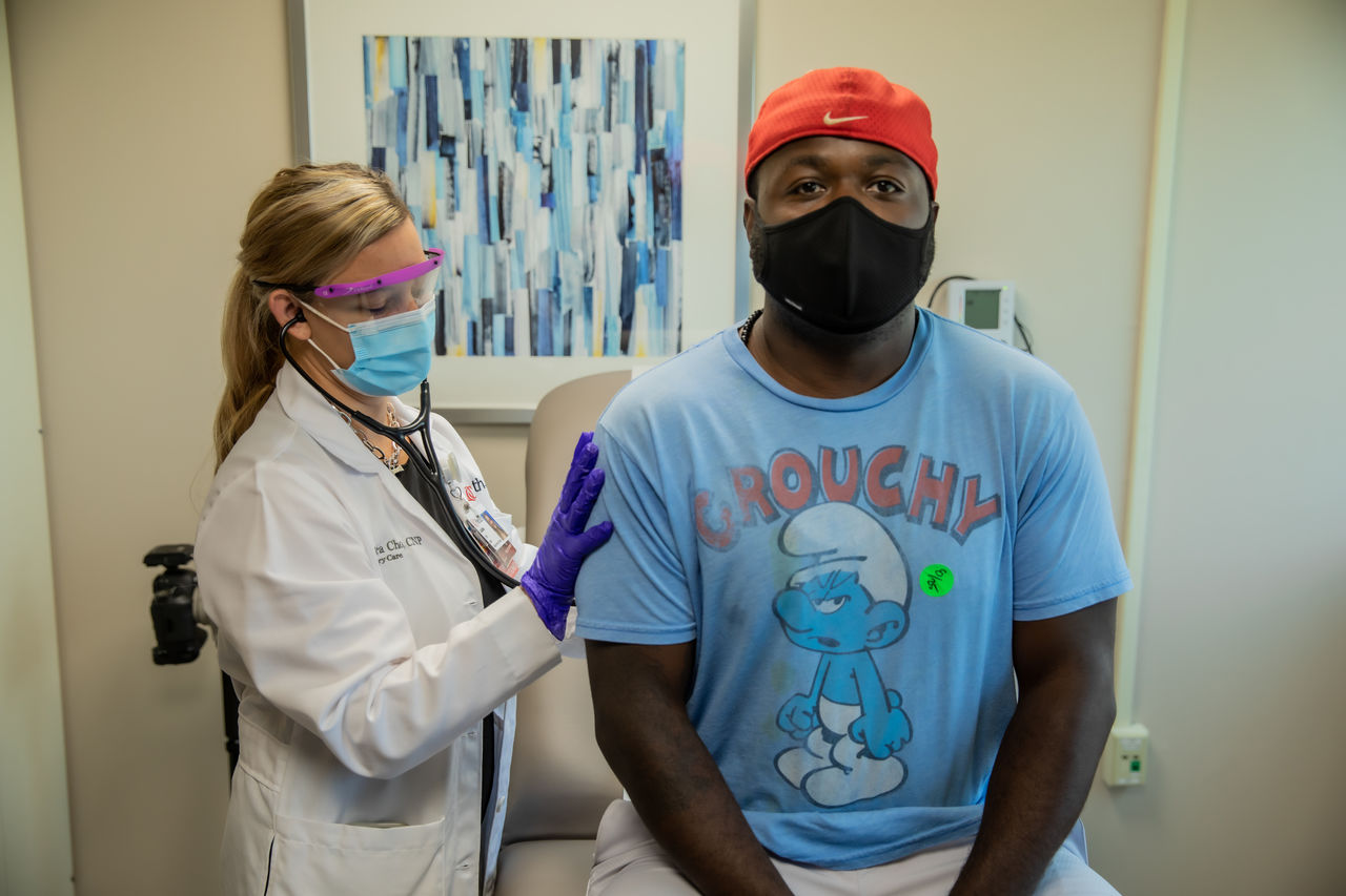This man in Ohio was among the tens of thousands who received Moderna's experimental COVID-19 vaccine in a recent trial that demonstrated 94.1% efficacy. Image courtesy of University of Cincinnati Health. United States, 2020. This man in Ohio was among the tens of thousands who received Moderna's experimental COVID-19 vaccine in a recent trial that demonstrated 94.1% efficacy. Image courtesy of University of Cincinnati Health. United States, 2020.