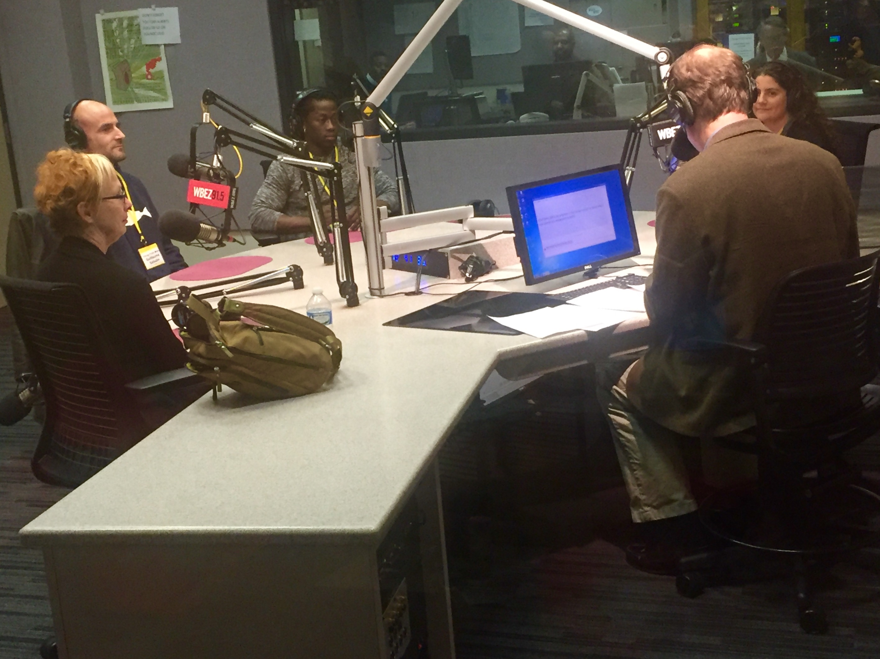 From left: Maribeth Joy, Yamoussa Bangoura, and Guillaume Saladin speak to WBEZ. Image by Mark Schulte. Chicago, 2015. Media file: image1.jpg