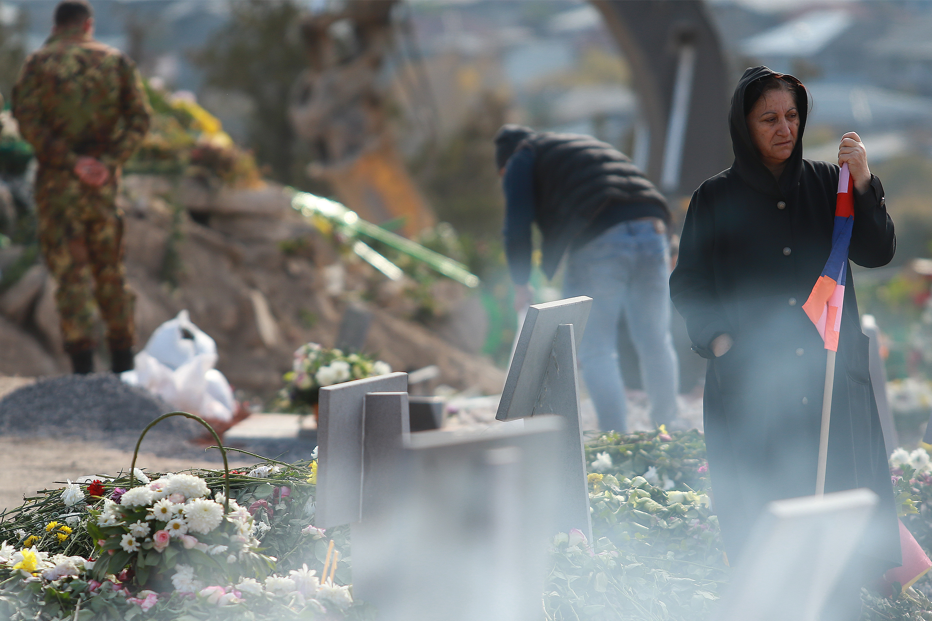 Flowers on the graves of fallen soldiers in Yerablur Military Memorial Cemetery in Yerevan. Image by Gevorg Ghazaryan / Shutterstock. Armenia, 2020. Flowers on the graves of fallen soldiers in Yerablur Military Memorial Cemetery in Yerevan. Image by Gevorg Ghazaryan / Shutterstock. Armenia, 2020.