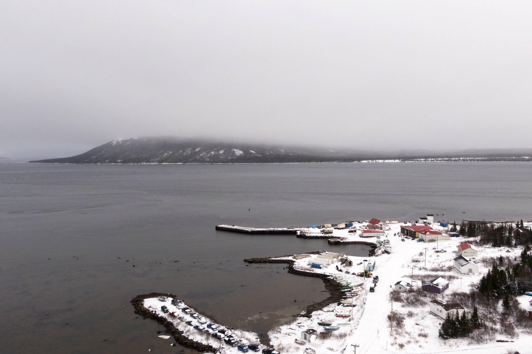 The town of Rigolet reaches out into the waters of Lake Melville on the coast of Labrador on November 14, 2019. Image by Michael G. Seamans. Canada, 2019. The town of Rigolet reaches out into the waters of Lake Melville on the coast of Labrador on November 14, 2019. Image by Michael G. Seamans. Canada, 2019.