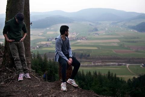 Rafat and Naif on the overlook in the Black Forest near Zell am Hammersbach, Germany. Image by Holly Pickett. Germany, 2014. Media file: pulitzer-photo.jpg