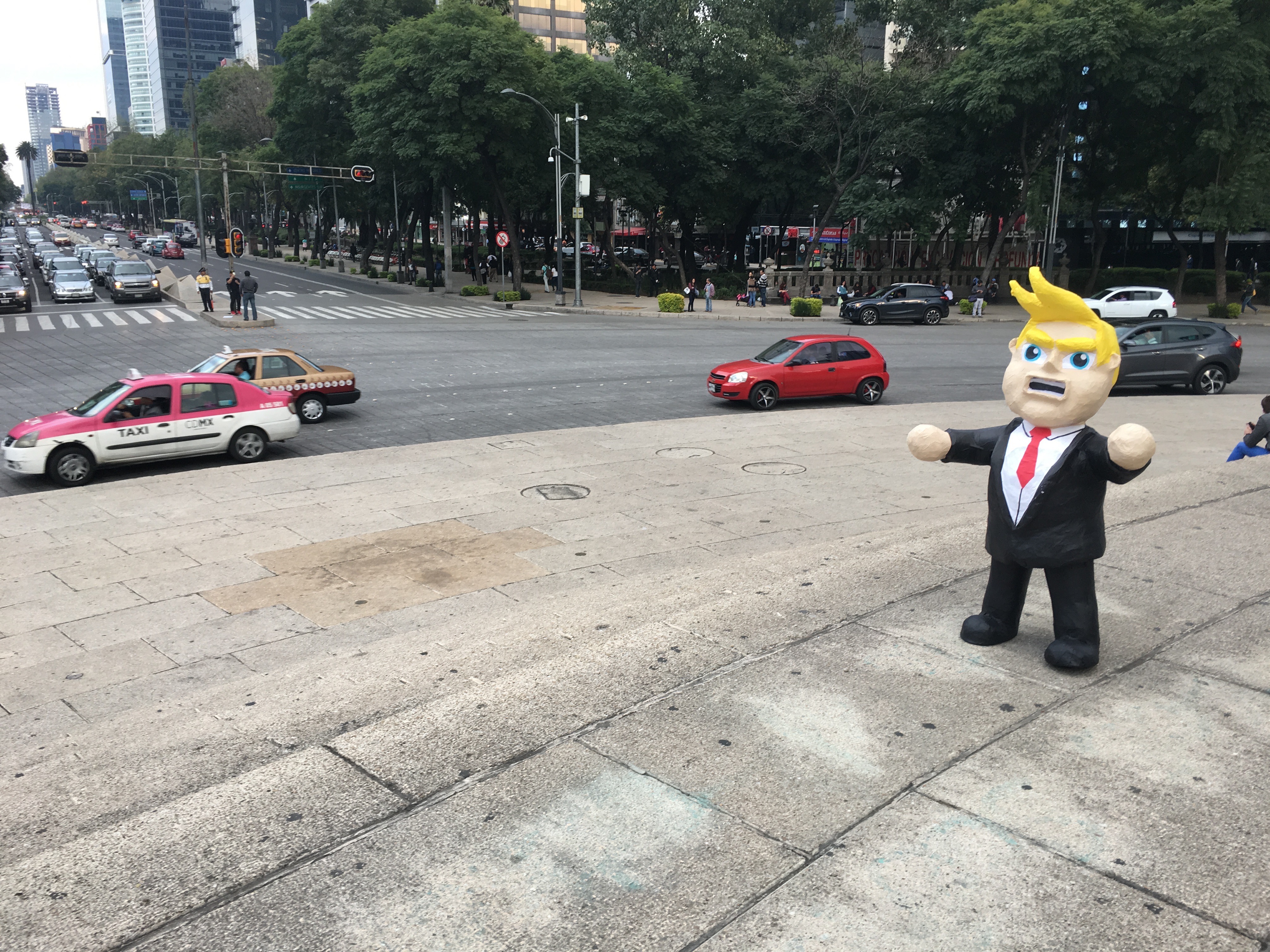 A Donald Trump piñata in the center of Mexico City. Many Mexicans are deeply fearful of Trump's enacting his campaign promises to cancel or alter NAFTA, restrict remittances sent to Mexico from the United States, deport millions of undocumented immigrants living in the U.S., and build a wall along the U.S.-Mexico border. Image by Nick Schifrin. Mexico, 2016. A Donald Trump piñata in the center of Mexico City. Many Mexicans are deeply fearful of Trump's enacting his campaign promises to cancel or alter NAFTA, restrict remittances sent to Mexico from the United States, deport millions of undocumented immigrants living in the U.S., and build a wall along the U.S.-Mexico border. Image by Nick Schifrin. Mexico, 2016.