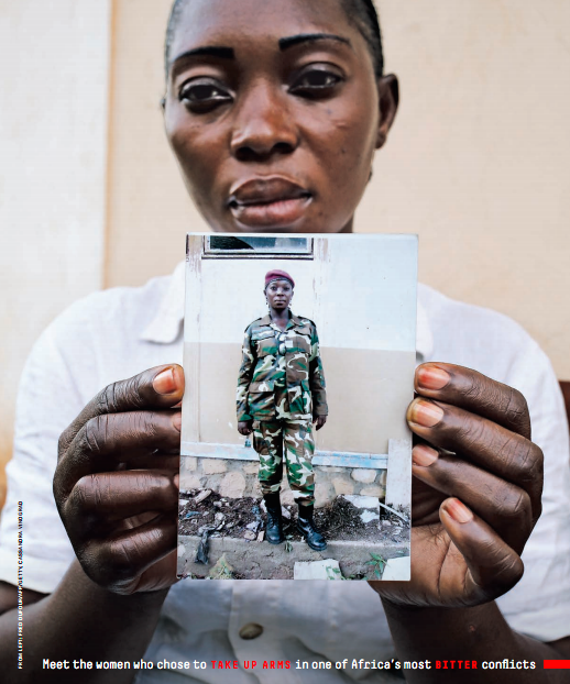 Marie-Yvette, photographed in Bangui on September 24, holds an undated picture of herself in her Séléka uniform. Image by Cassandra Vinograd. Central African Republic, 2017. Marie-Yvette, photographed in Bangui on September 24, holds an undated picture of herself in her Séléka uniform. Image by Cassandra Vinograd. Central African Republic, 2017.