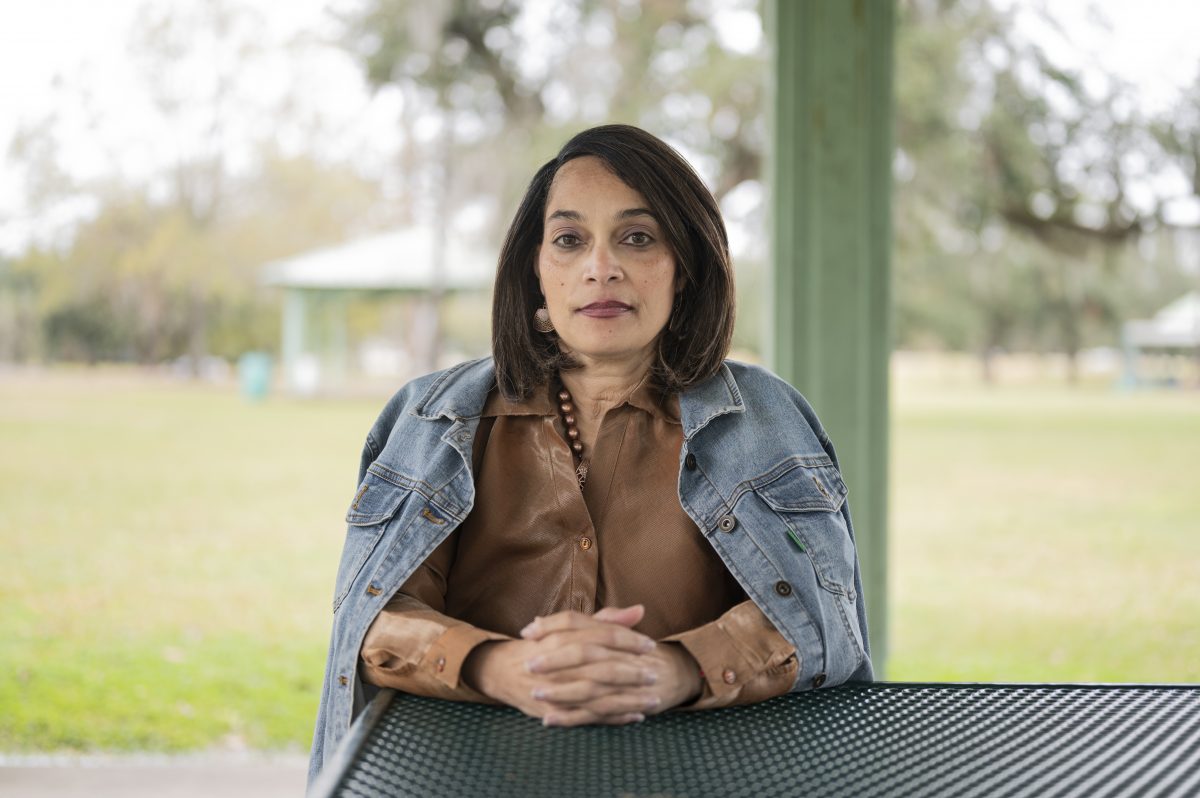 Dr. Lisa Morgan at Girard Park near where she is staying after her home in Lake Charles was damaged during back-to-back hurricanes in August and October. Image by Katie Sikora. United States, 2020. Dr. Lisa Morgan at Girard Park near where she is staying after her home in Lake Charles was damaged during back-to-back hurricanes in August and October. Image by Katie Sikora. United States, 2020.