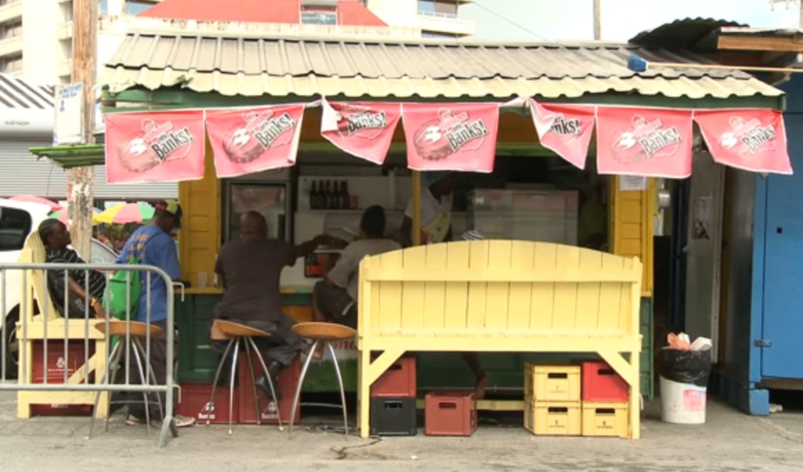 An outdoor food stand in Jamaica. Image by Robin Wigglesworth. Jamaica, 2013. Media file: wigglesworth3.jpg