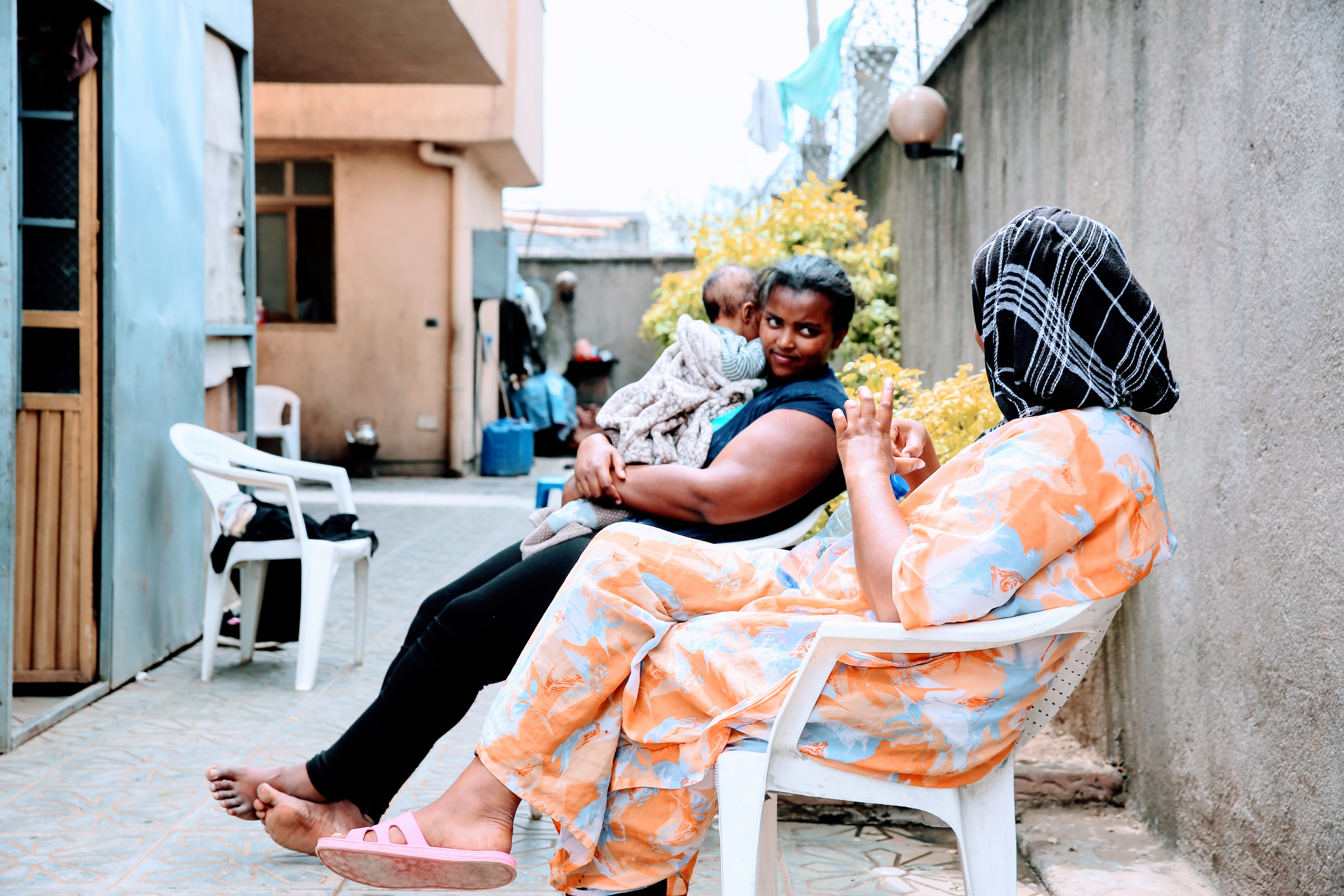 Women being cared for talk on the back patio of Agar. Image by Meklit Mersha. Ethiopia, 2019. Women being cared for talk on the back patio of Agar. Image by Meklit Mersha. Ethiopia, 2019.