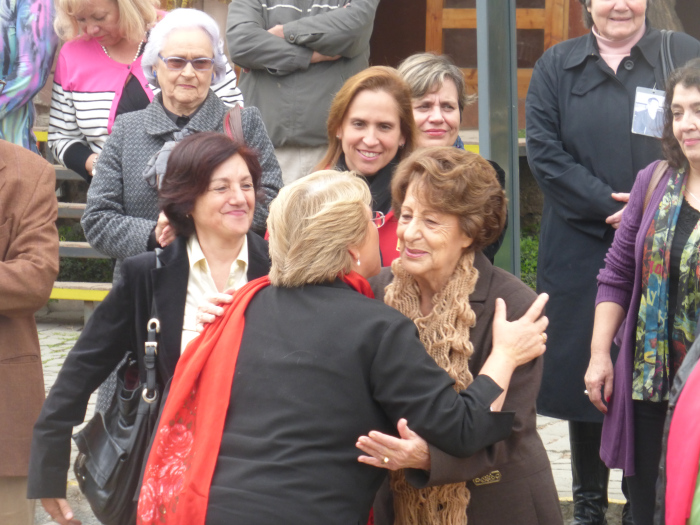 Michelle Bachelet hugs her mother Angela Jeria at the Villa Grimaldi compound where they both were detained during the Pinochet dictatorship. Image by Jeff Kelly Lowenstein. Chile, 2013. Media file: bachelet_and_jeria.jpg
