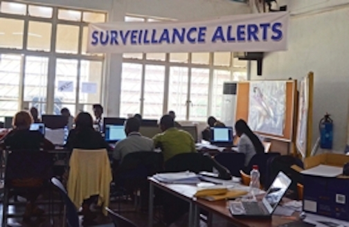 In the Command Center, the heart of the Ebola response in Freetown and the surrounding western district. Image by Amy Maxmen. Sierra Leone, 2014. Media file: 30f174fa-d7d0-4d62-8f261eb674e4803a_article.jpg