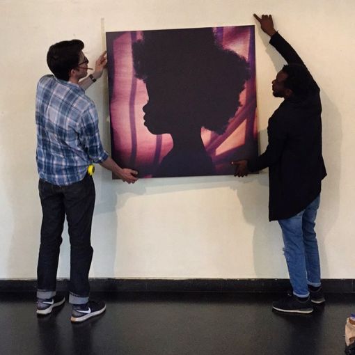 A photo from Everyday Africa is hung at an exhibition in Nairobi. Image courtesy of Peter DiCampo. Kenya, 2017. A photo from Everyday Africa is hung at an exhibition in Nairobi. Image courtesy of Peter DiCampo. Kenya, 2017.