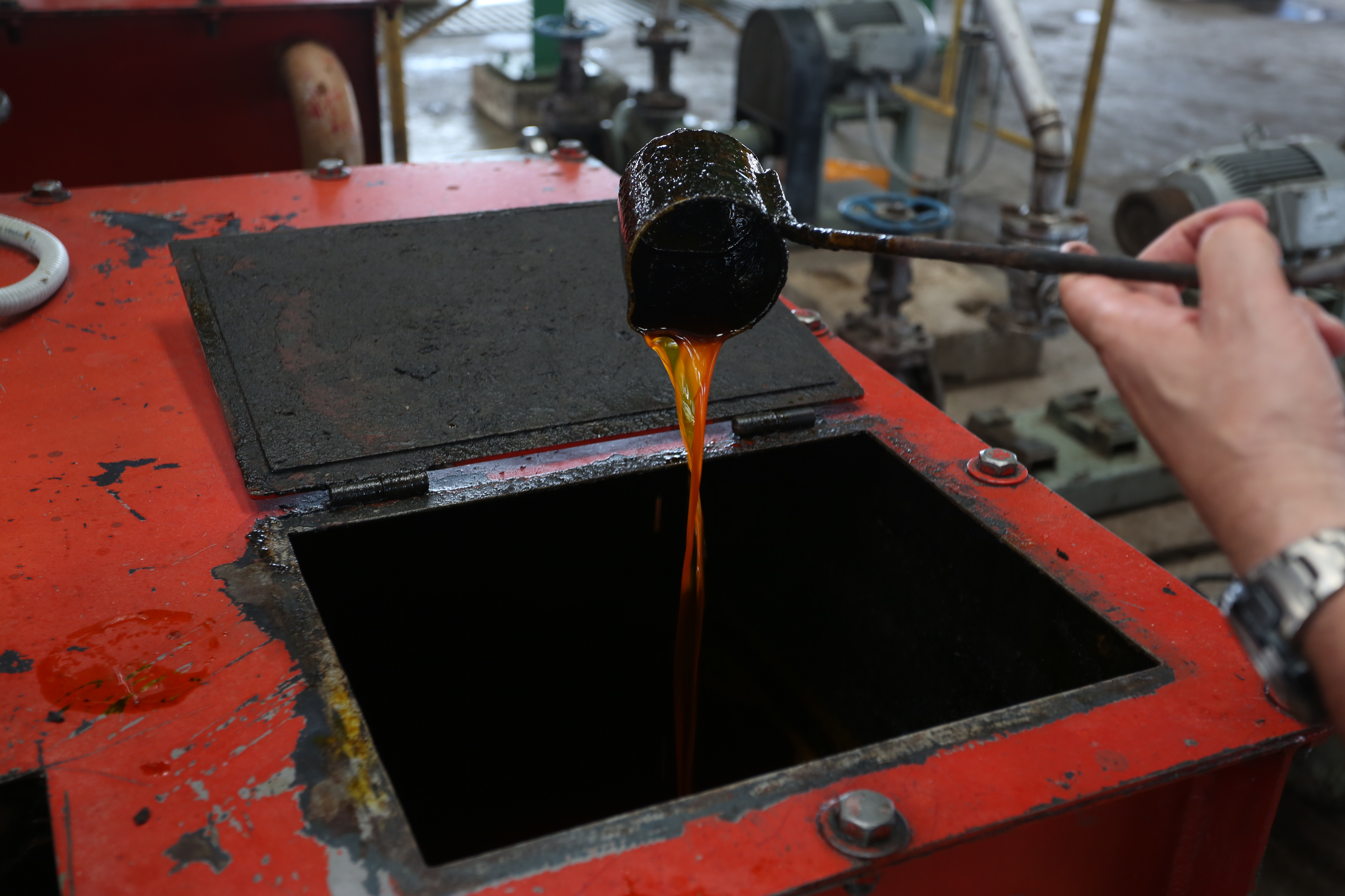 Palm oil is shown after being extracted from palm fruits at the palm oil processing plant in Cabuyaro, Colombia. Image by Gabe Silverman/The Washington Post. Colombia, 2014. Media file: colombia_palmoil_131418067795.jpg