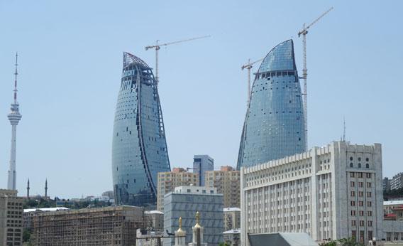 The Flame Towers, shown here under construction in Baku were finished quickly in time for Eurovision. Image by Johannes Eisele/AFP/Getty Images. Media file: 120524_For_Baku-EX.jpg.CROP_.rectangle3-large.jpg