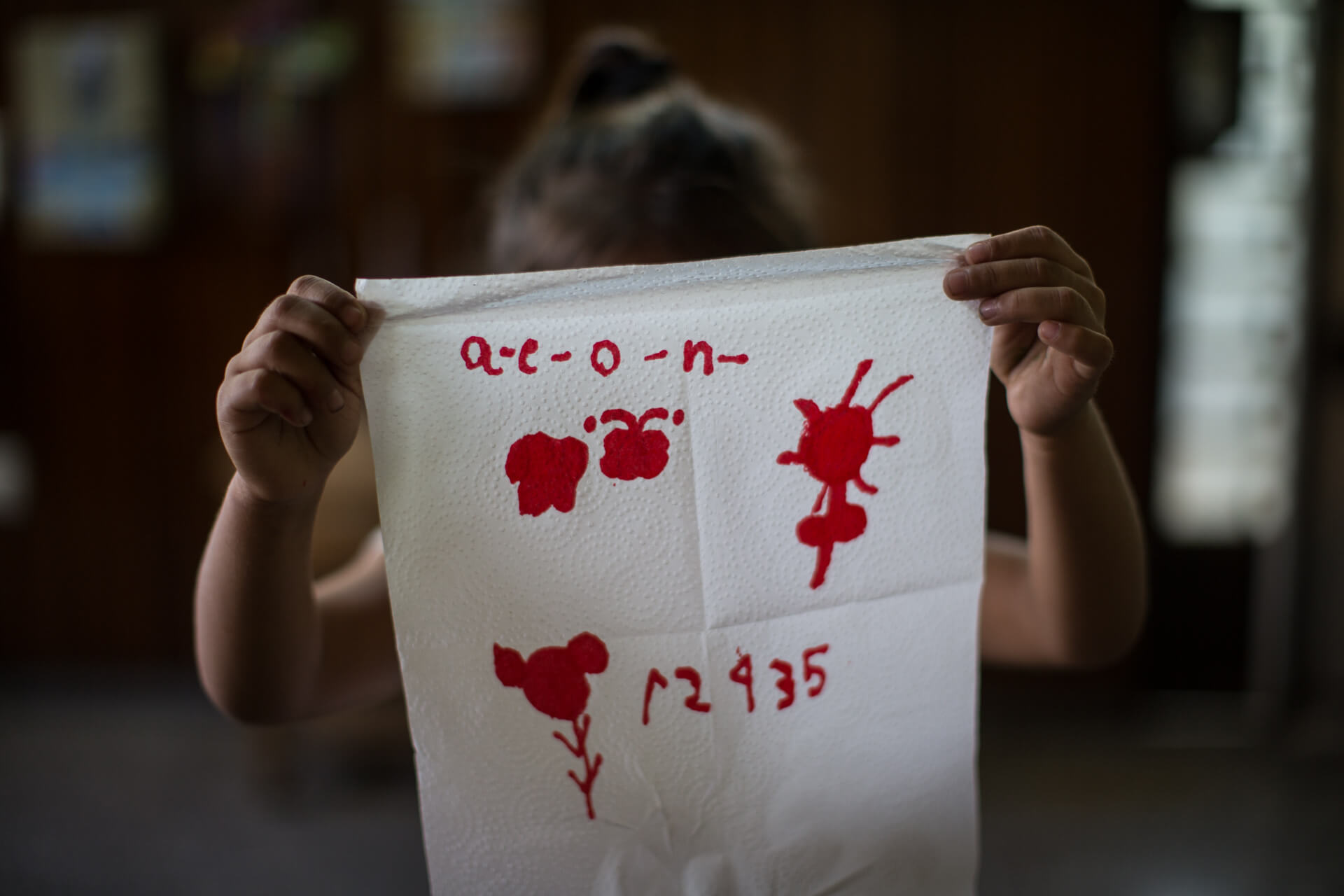 Ashley,6.
Her father was a gang member. As a way of protecting her and her brother's lives, she understands she should not say where she lived or who her father was. At such a young age, she attempted suicide when her father and mother were arrested. The Salvadoran Association Pro-Rural Health helps her with school and guides her grandmother to cooperate in human and educational training.
Image by Almudena Toral. El Salvador, 2018. Ashley,6.
Her father was a gang member. As a way of protecting her and her brother's lives, she understands she should not say where she lived or who her father was. At such a young age, she attempted suicide when her father and mother were arrested. The Salvadoran Association Pro-Rural Health helps her with school and guides her grandmother to cooperate in human and educational training.
Image by Almudena Toral. El Salvador, 2018.