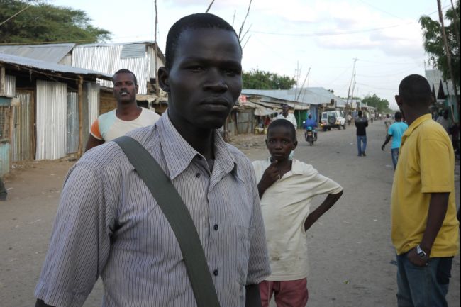 Reth Maker, who has lived in Kakuma for two decades, was one of Sudan's "Lost Boys" when he arrived in 1992 at the age of 5. He is now a teacher in one the camp's schools and dreams of one day starting a family, but he has few prospects. Image by Sam Loewenberg. Kenya, 2012. Media file: 20121108_refugee_camp_sl.jpg