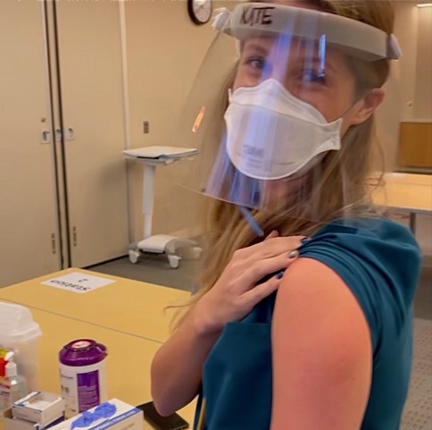 Kate smiles after receiving the first dose of the Pfizer-BioNTech COVID-19 vaccine in December. Image courtesy of Kate. United States, 2020. Kate smiles after receiving the first dose of the Pfizer-BioNTech COVID-19 vaccine in December. Image courtesy of Kate. United States, 2020.
