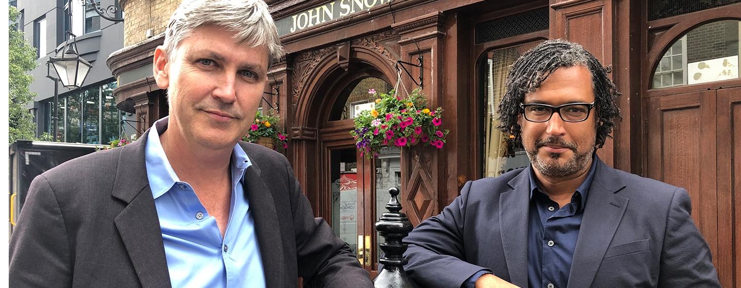 70f81f2d84_Extra_Life_About.jpg Steven Johnson and David Olusoga stand together on a city street.