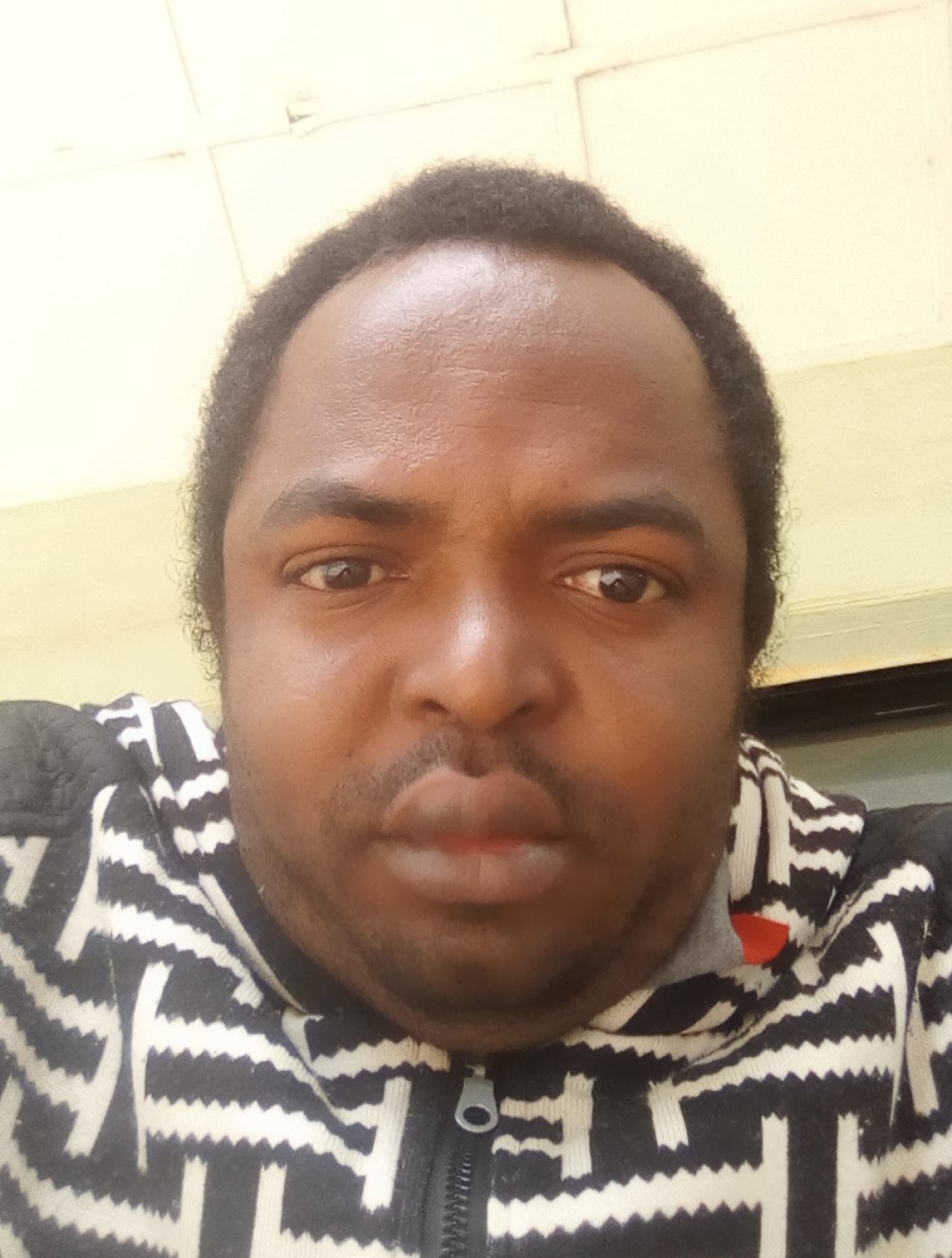 Headshot of Nkrumah Bankong-Obi