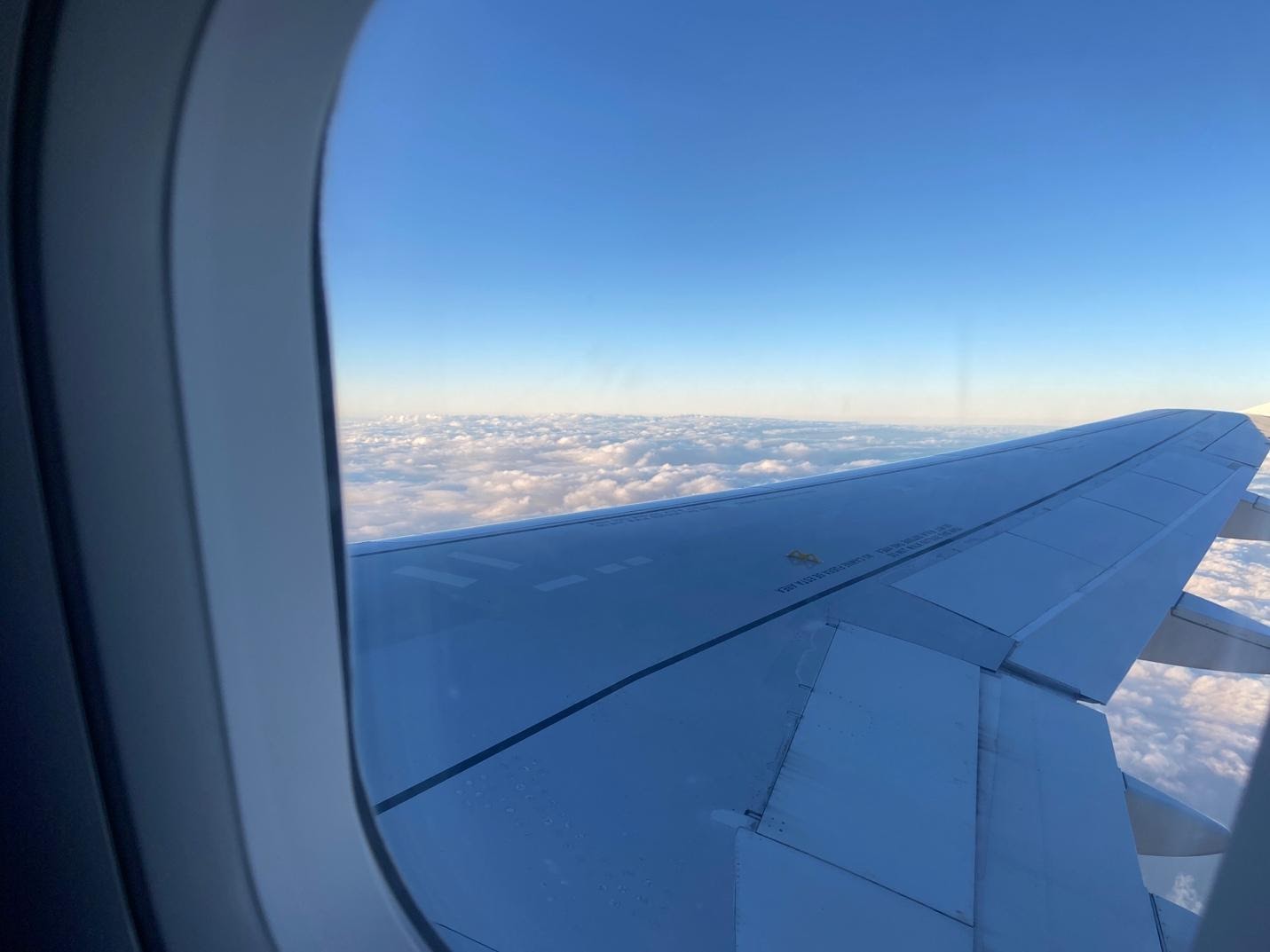 image1.jpeg View of a plane wing from a cabin window.