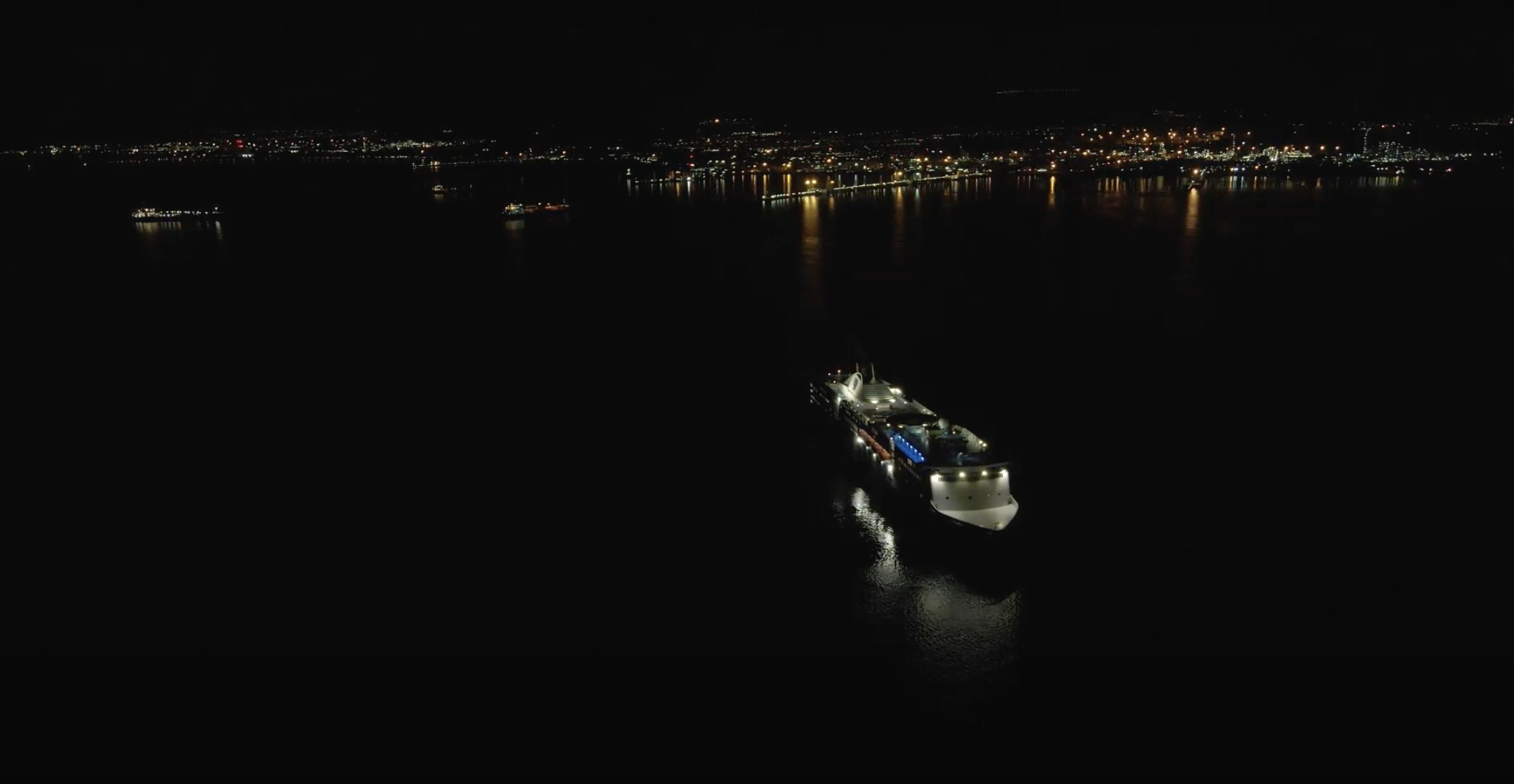 Drone footage of cruise ship at night.png Aerial drone footage of a cruise ship at night