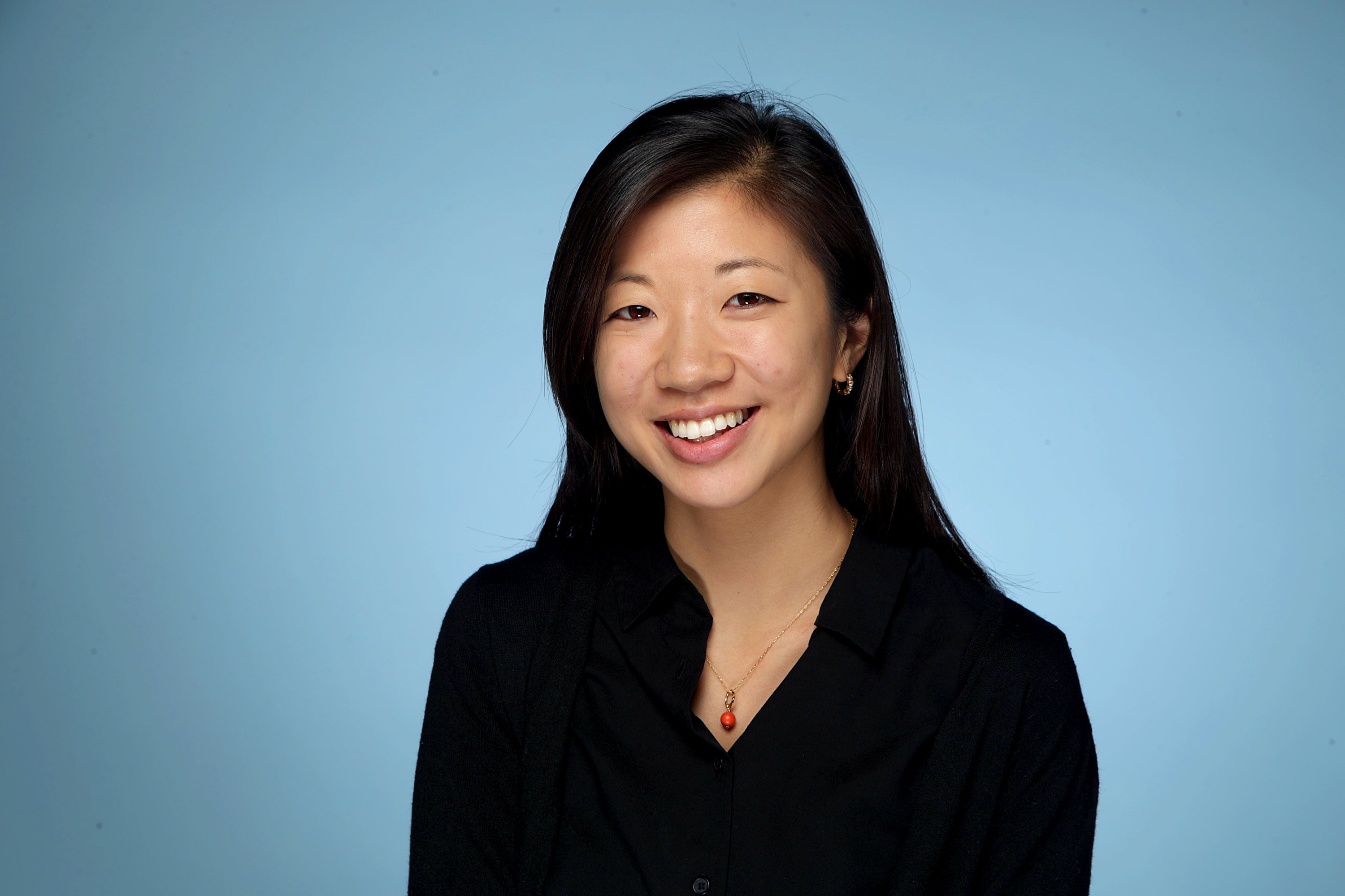 photo of Alice su in front of blue background