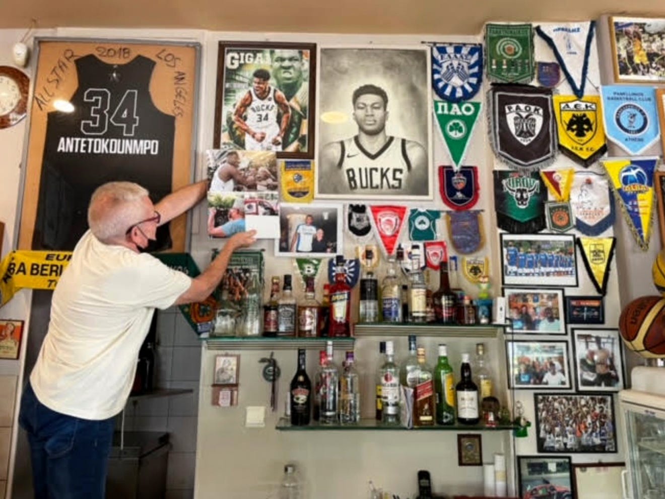 Man standing with posters