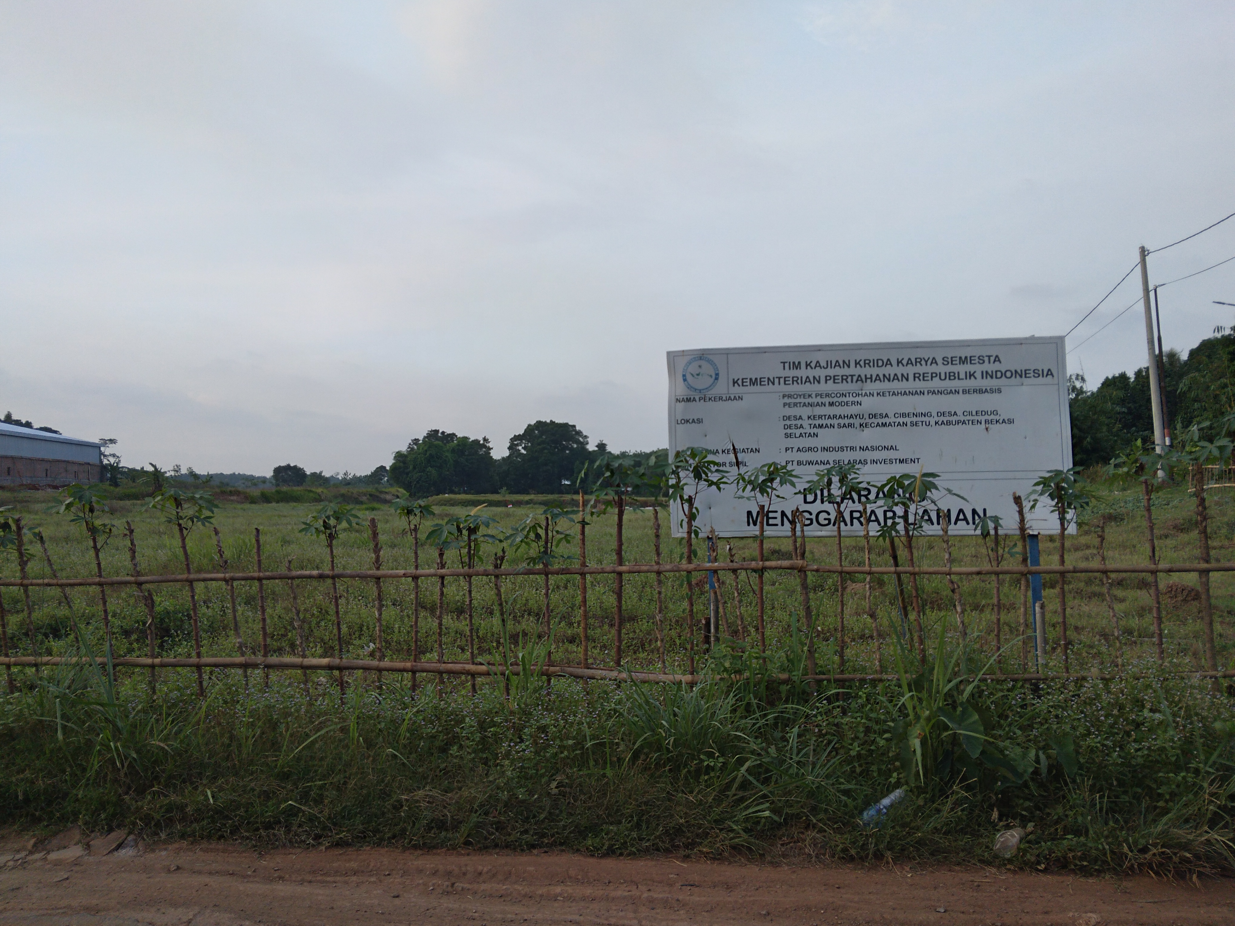 The empty field with a sign post on the site of Agrinas's Research and Development Center, or Agrinas Capability Center, in Kertarahayu village, Bekasi Regency, West Java, September 27, 2021.