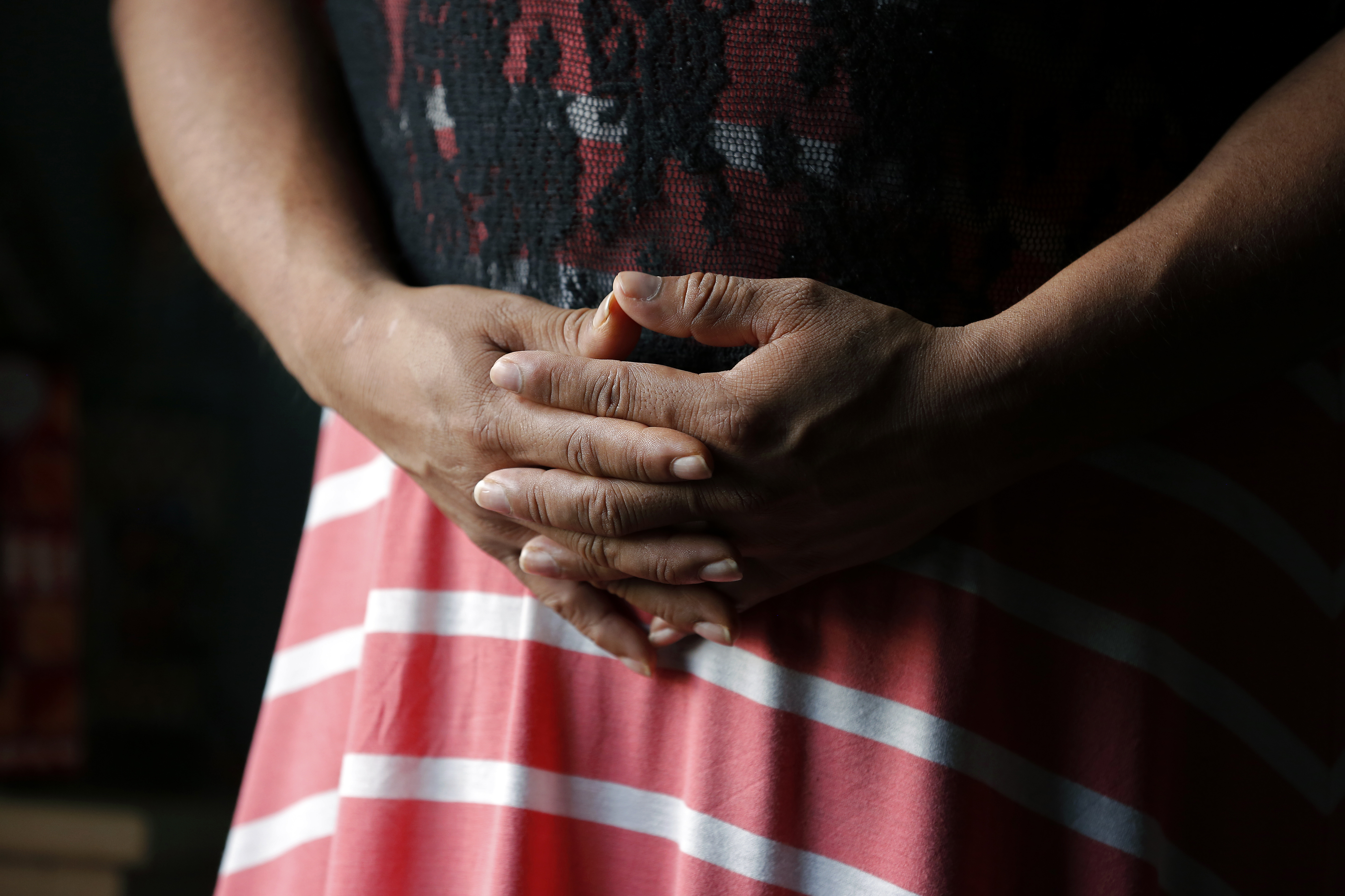 Brisa's clasped hands
