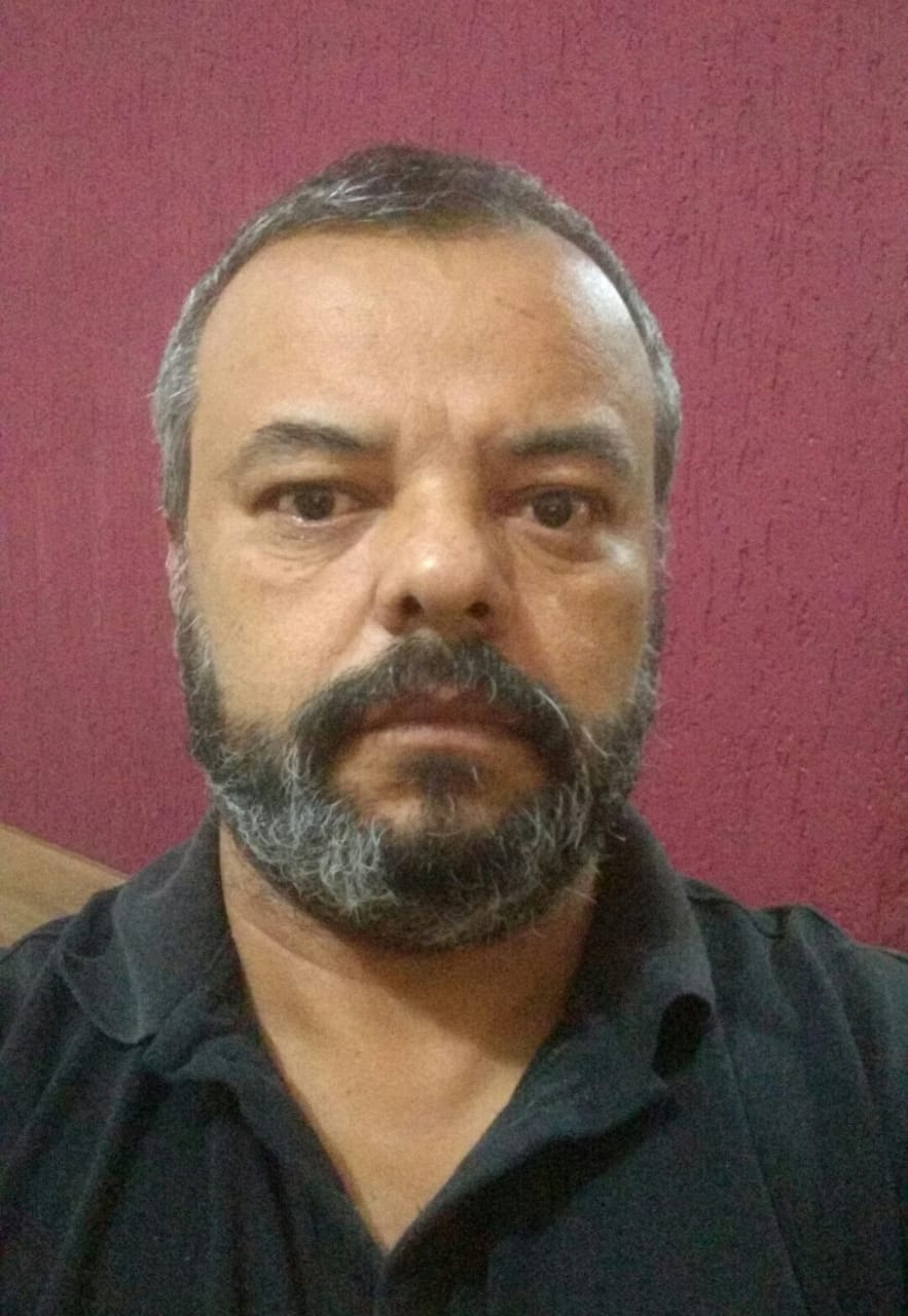 A man wears a black shirt.