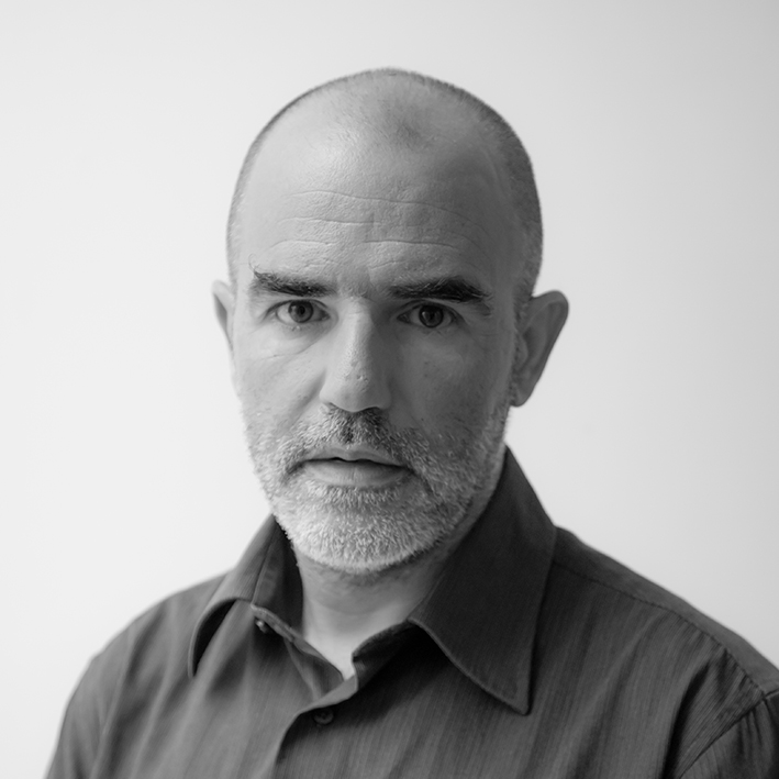A bald man with a shirt.