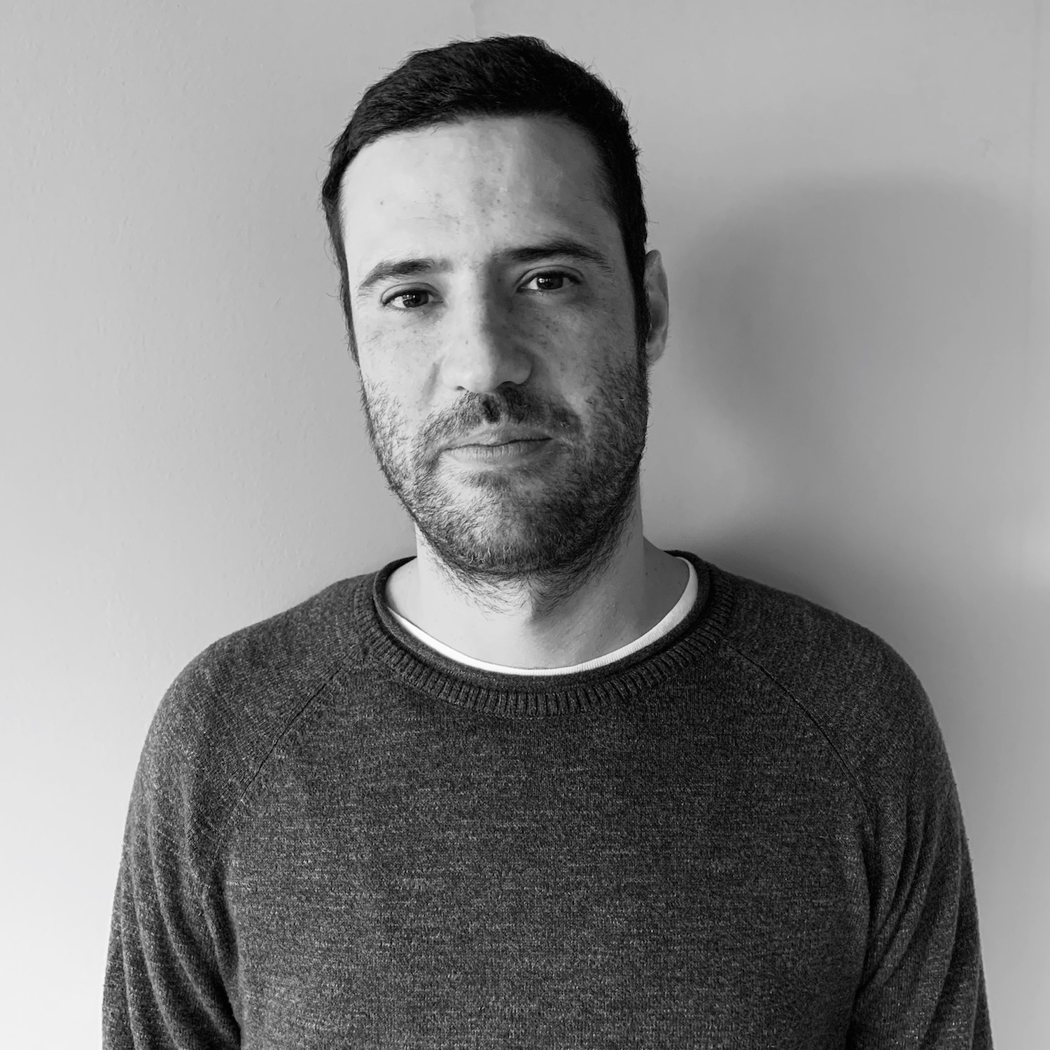 A man wearing a sweatshirt.