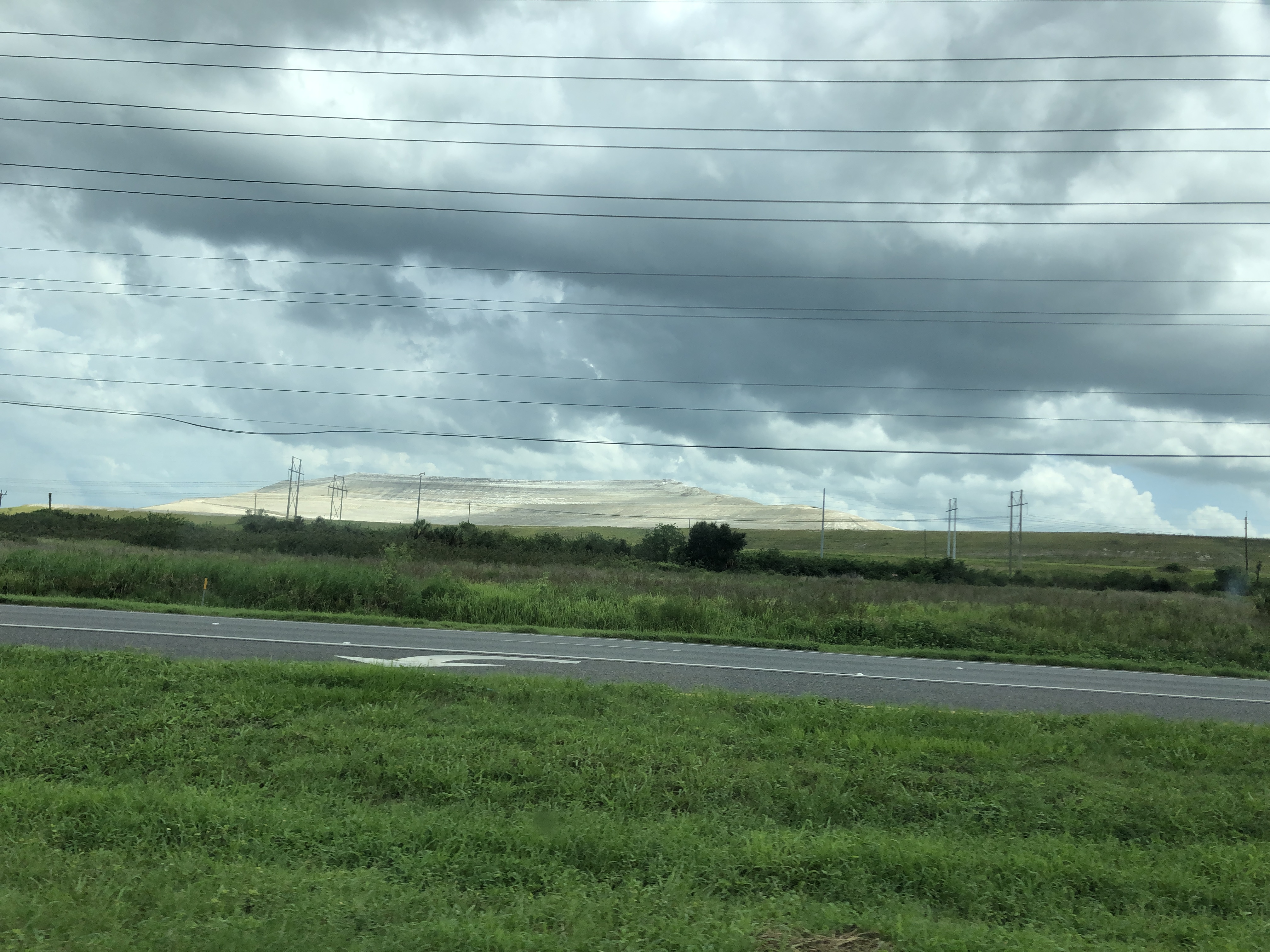image1.jpeg phosphogypsum stack rises in the distanc