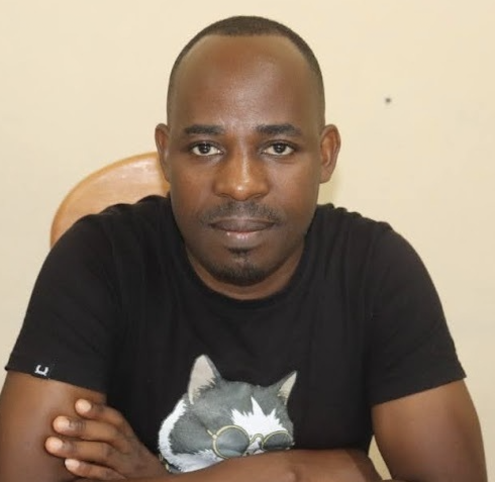 A man wears a black shirt.
