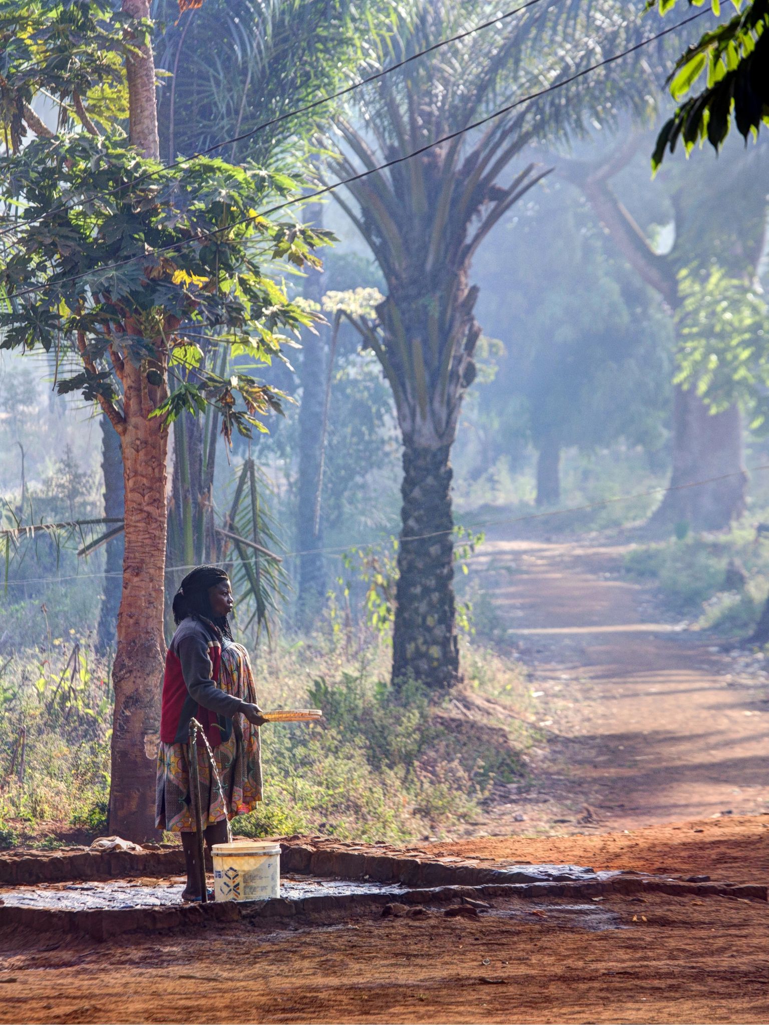 a woman is on a forest