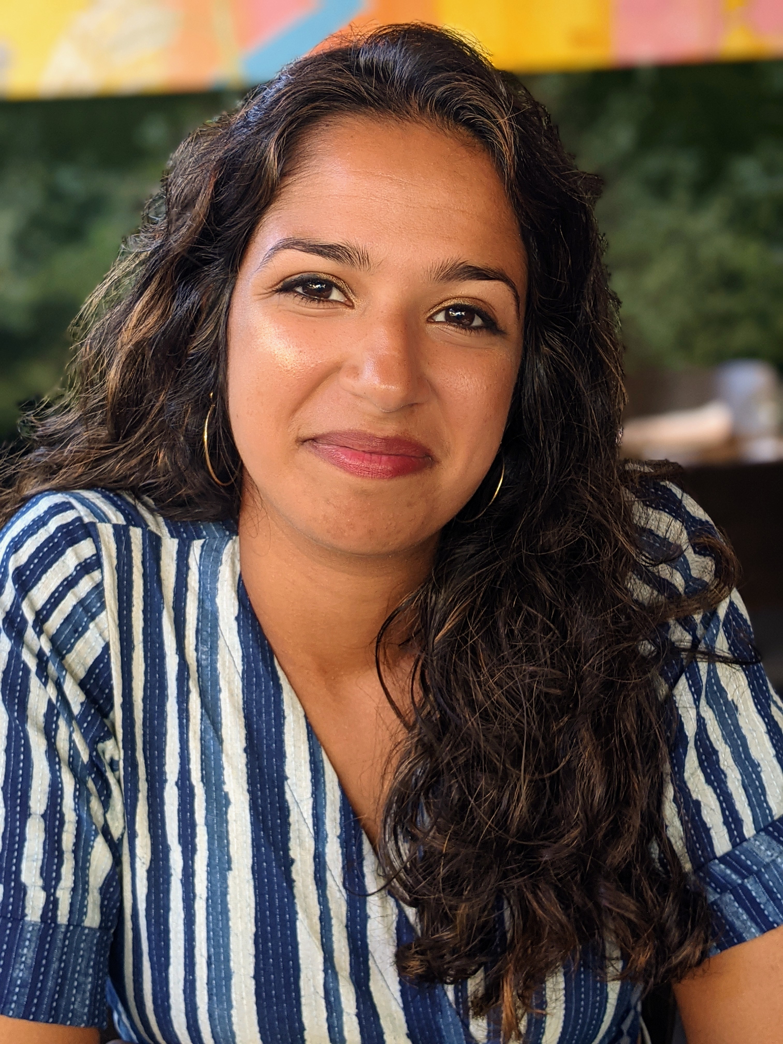 Headshot for Julie Emra.