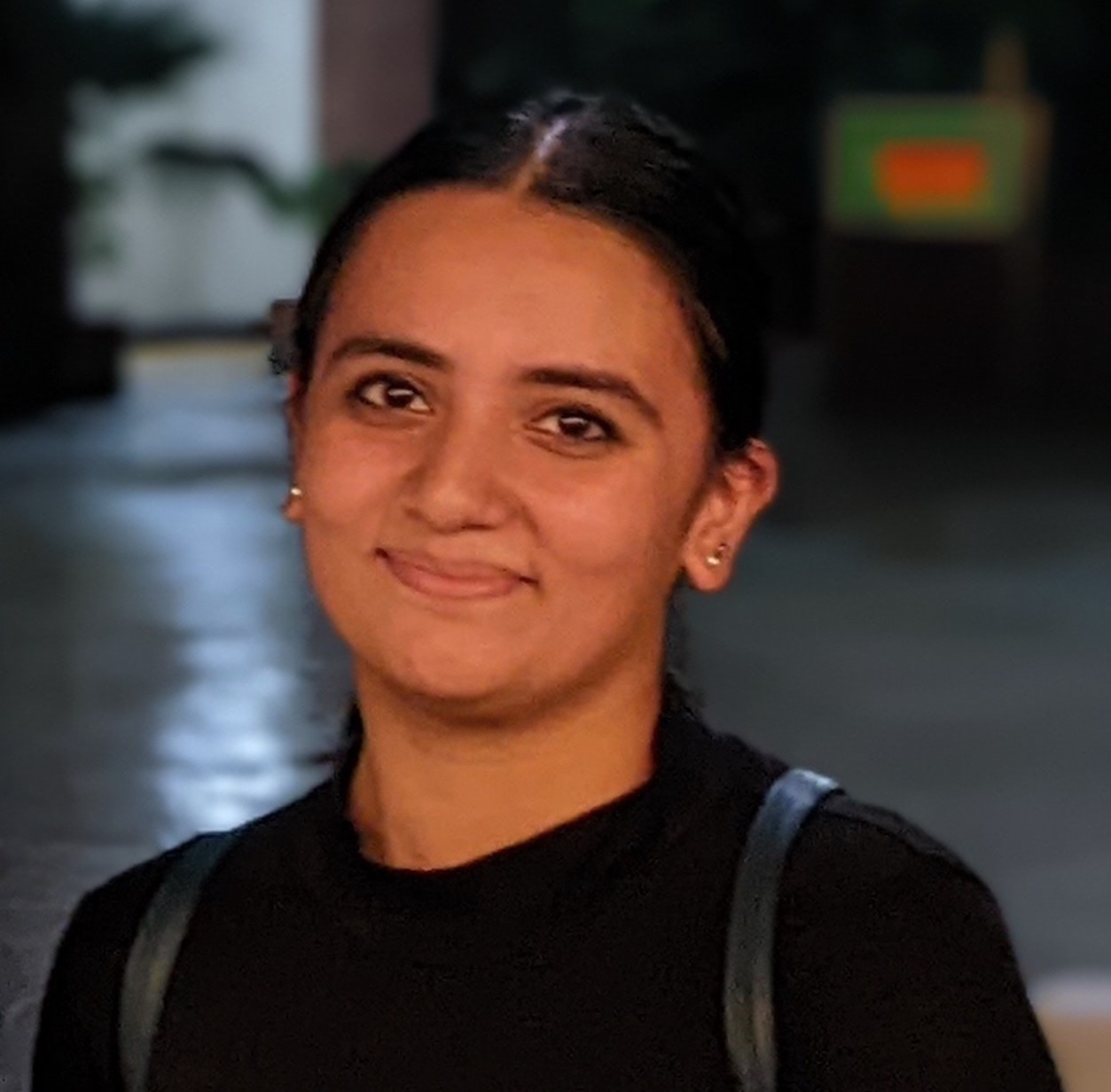 headshot of Maseera Khan