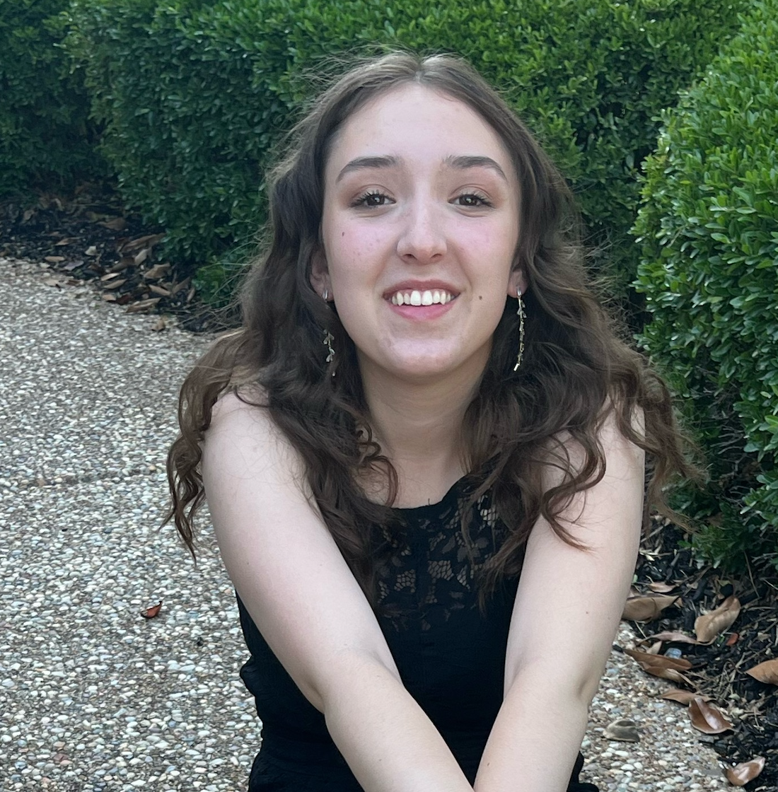 Photo of Olivia outside wearing black