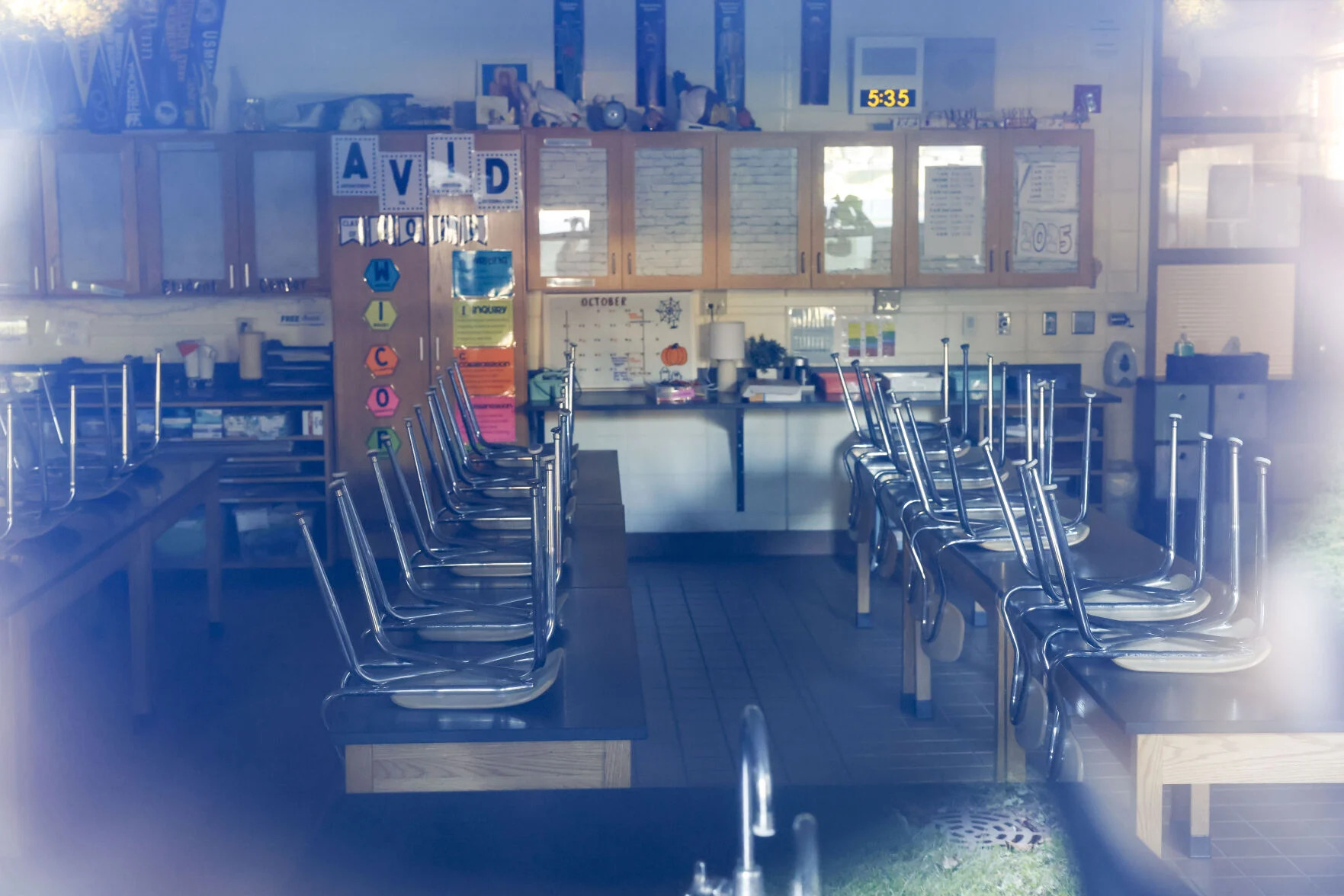 Classroom with chairs on desks