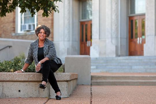 Judy Gladney, 67, poses for a portrait at University City High School on Monday, Sept. 30, 2019, ahead of her 50th high school reunion. Gladney was among the first waves of African American students to integrate the high school. Image by Cristina M. Fletes. United States, 2019. Judy Gladney, 67, poses for a portrait at University City High School on Monday, Sept. 30, 2019, ahead of her 50th high school reunion. Gladney was among the first waves of African American students to integrate the high school. Image by Cristina M. Fletes. United States, 2019.