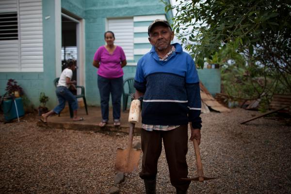 Jesus Maria Fajardo, 75, is a farmer in the Dominican Republic who lost his right arm and eye in an accident. He and his family were relocated by the government after the government bought their land in order to lease it to the mining company Barrick for the Pueblo Viejo mine. Fajardo says he was not fairly compensated for his farm. Image by Ben Depp. Dominican Republic, 2012. Media file: BENDEPP (11 of 16).jpg