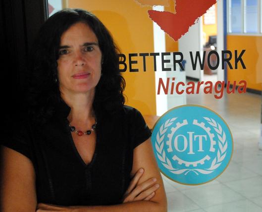Elena Arengo, coordinator of Better Work Nicaragua, says the program will help attract major brands interested in suppliers that comply with local labor laws. That way, she says, labor can benefit from regional free trade. Image by Tim Rogers. Nicaragua, 2012. Media file: CAFTA-in-Nicaragua_newsfull_h.jpg