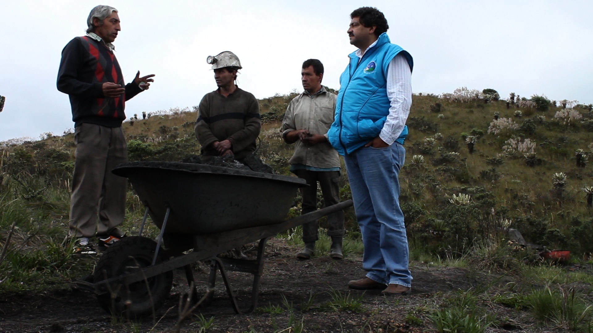 Javier Garzón (right), mayor of Cogua, a small town in the Colombian Andes, tries a soft conciliatory approach to explain illegal miners that their activity is putting at risk the water provision for their own families. Image by Anna-Katarina Gravgaard, Colombia, 2011.