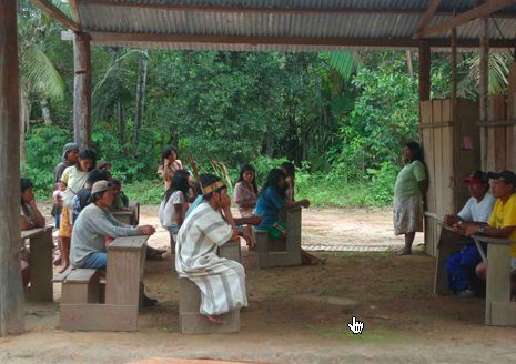 Meeting in Porotobango. Photograph Courtesy of Lone OutPost, Inc. 1