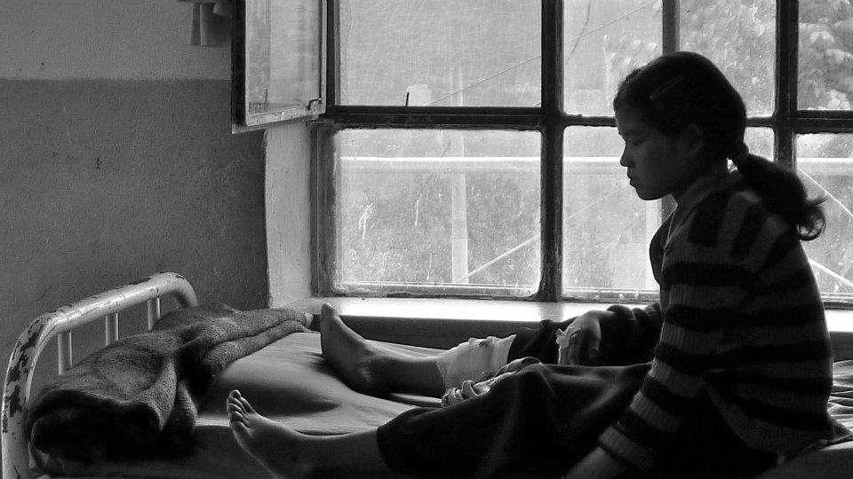 A girl in a hospital in Dolakha, Nepal. Anna Tomasulo, 2011.