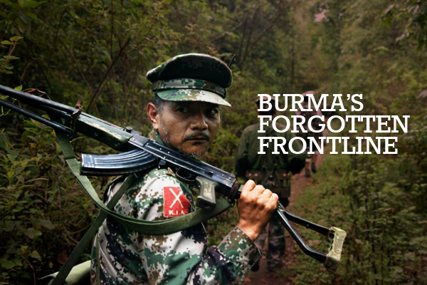 Kachin Independence Army fighters on patrol near the frontline, southern Kachin state. A Burmese Army outpost sits about a mile away from their forward outpost. Image by Jason Motlagh. Burma, June 2012. Media file: Kachin-burma.jpg