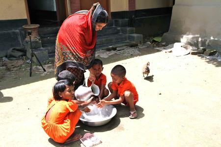 Children wash hands at a child development center in Monohardi, Bangladesh. The centers are called "anchals," from the end piece of a sari mothers use to cover and carry their children (Photo by Jon Sawyer). Children wash hands at a child development center in Monohardi, Bangladesh. The centers are called "anchals," from the end piece of a sari mothers use to cover and carry their children (Photo by Jon Sawyer).