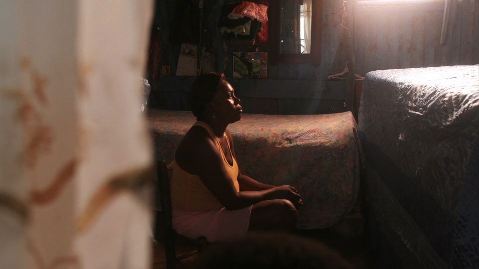 A Haitian woman. Image by Andre Lambertson, Haiti 2011.